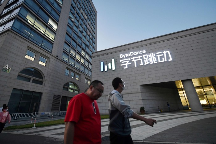 People walk past the ByteDance headquarters in Beijing. The Chinese government has a ‘golden share’ in the company’s main Chinese entity, while Communist party official Wu Shugang is a director