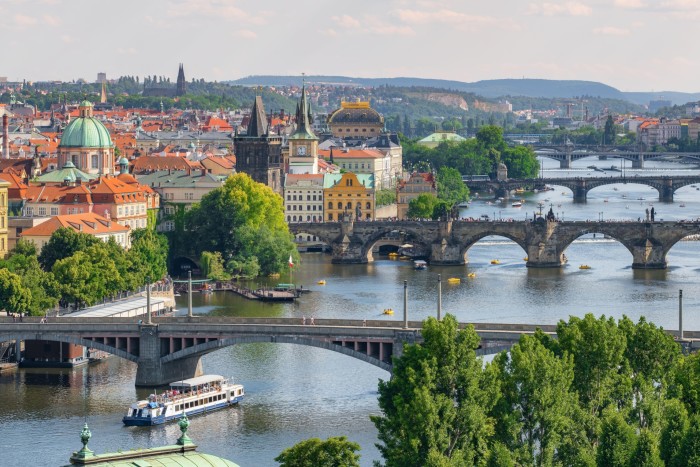 Prague old town cityscape with Charles bridge and Vltava river